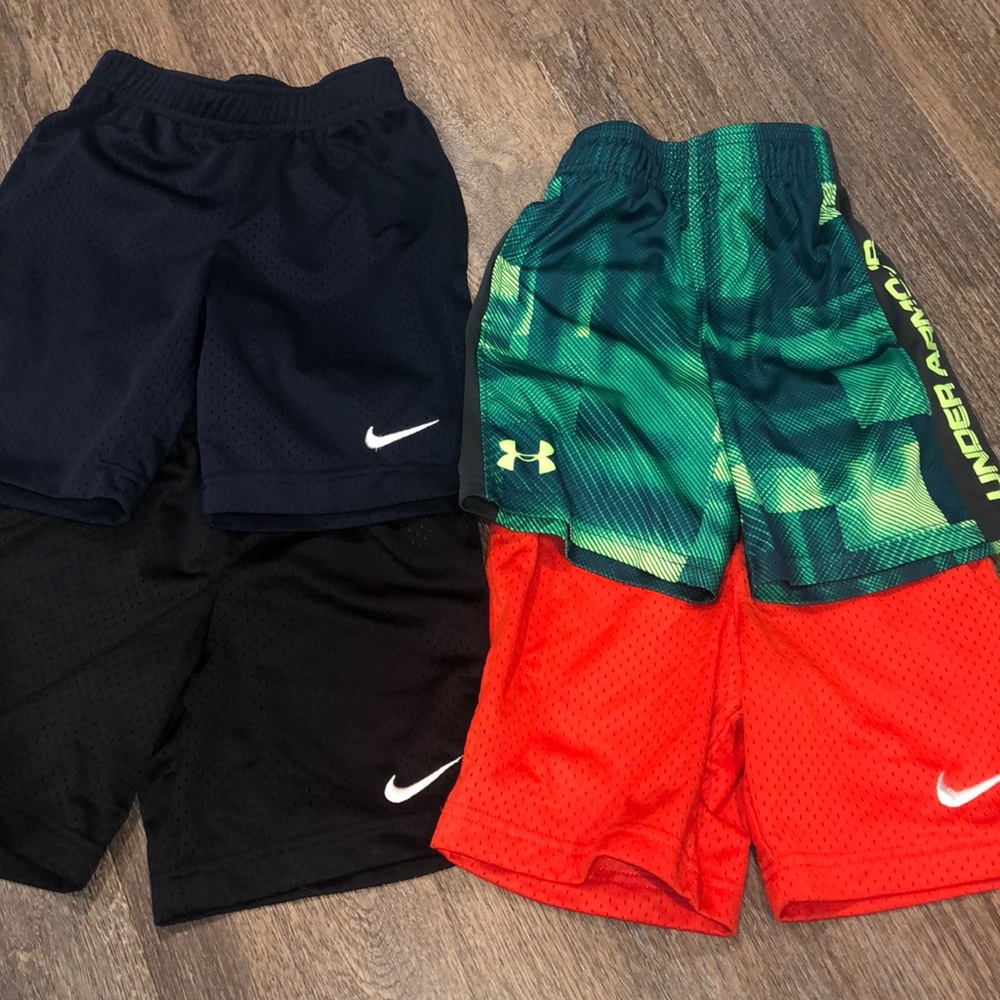 4 pair of Nike Under Armour shorts